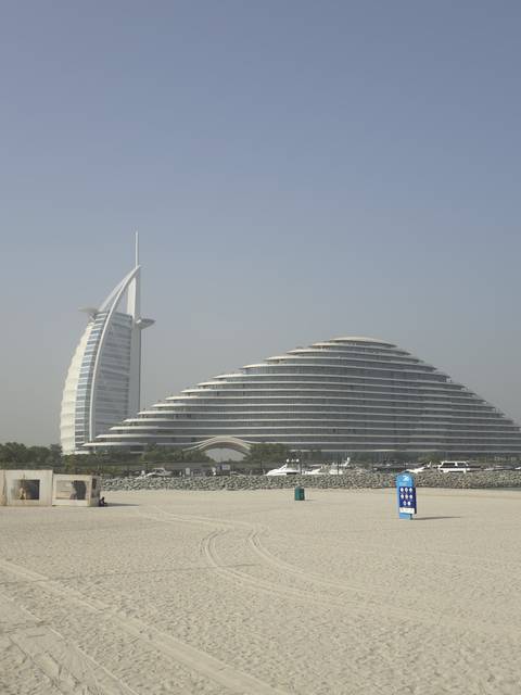       Iconic modern buildings on a hazy day.
  