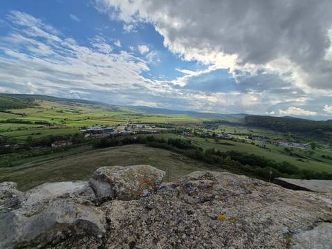 Panoramic view of a valley and small town.