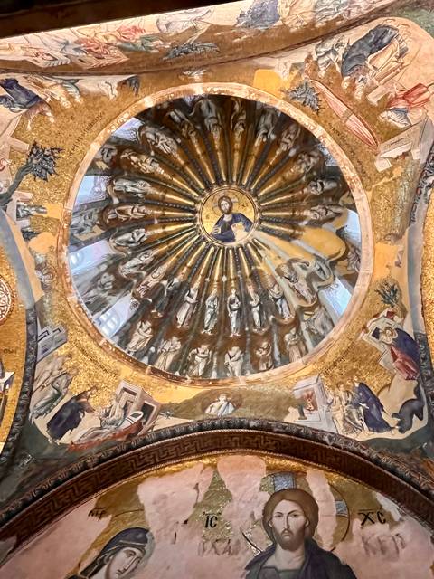 Ornate ceiling with religious artwork.