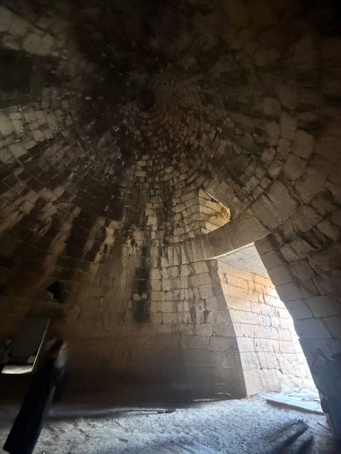       Interior stone structure with curved ceiling.
  