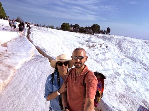       Couple at Pamukkale's travertine terraces.
  