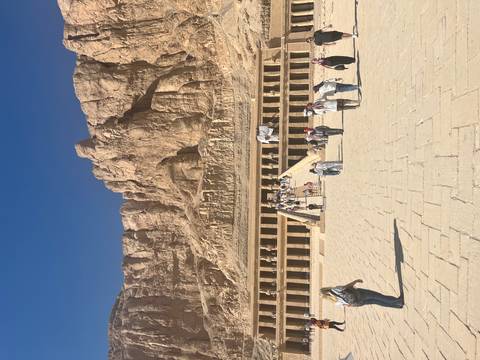       Temple with a dramatic mountainous background.
  