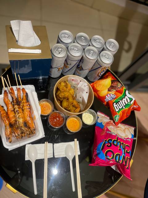      Selection of street food with prawns and sauces.
  