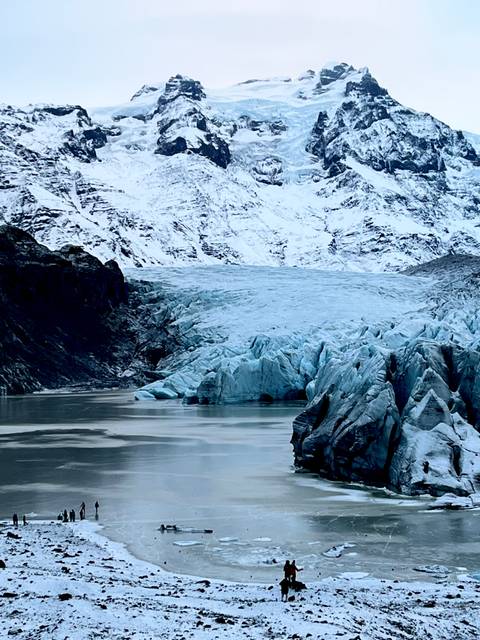 Icy landscape featuring a large glacier.