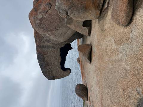      Intriguing rock formations along a rugged coastline.
  