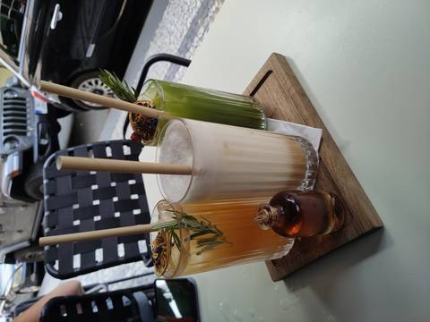       Close-up of creative drinks in glasses.
  