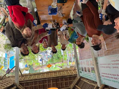 A group participating in a local community service activity.