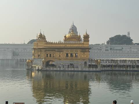 The Golden Temple in Amritsar reflecting on the water.