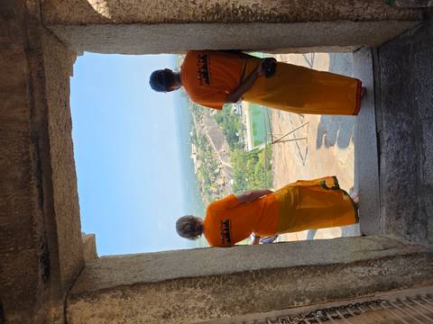 Viewing platform with two people overlooking the landscape.