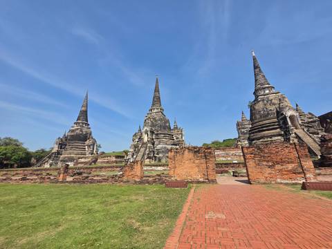 Ancient temple ruins with pointed stupas.