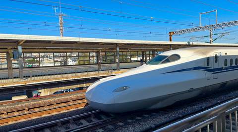 High-speed train at a platform.