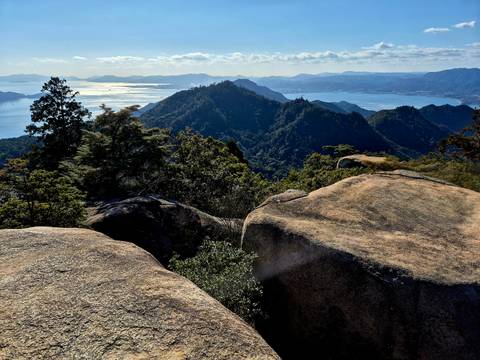      Scenic view of mountains and water from a high vantage point.
  