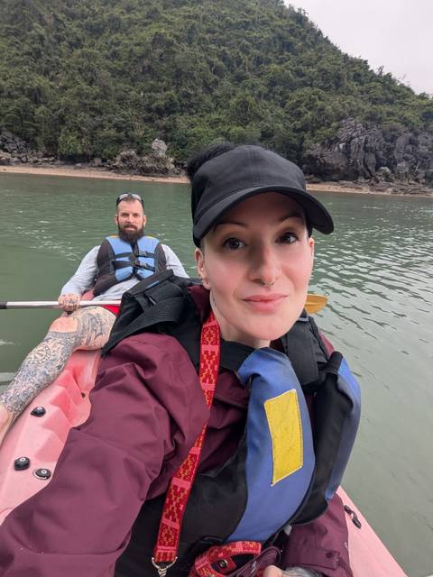 Two people in a kayak enjoying a serene boating experience.