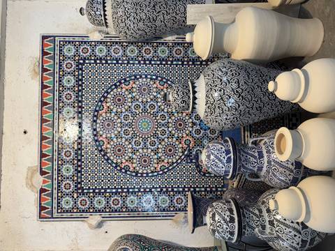 Colorful ceramic pots and mosaic tiles.
