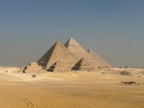       Panoramic view of the Pyramids of Giza from the desert.
  