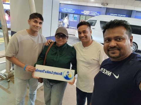 Group of people taking a selfie in casual attire