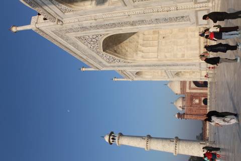 Tourists walking near the Taj Mahal.