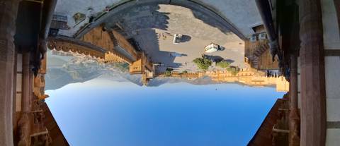 Panoramic view of a fort with surrounding landscape.