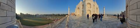 Tourists exploring the area around the Taj Mahal.