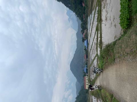 Rural scene with mountains in the background.