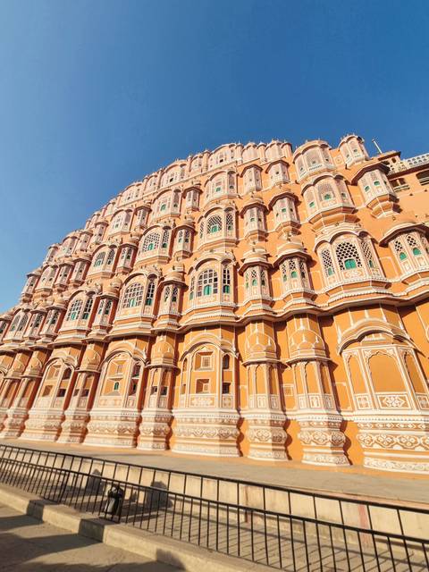       Hawa Mahal's intricate facade with multiple windows.
  