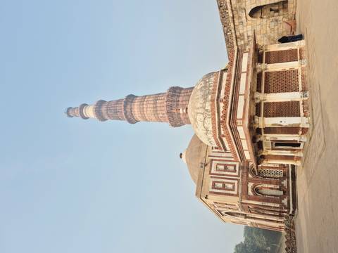       Qutub Minar complex showing detailed architecture.
  