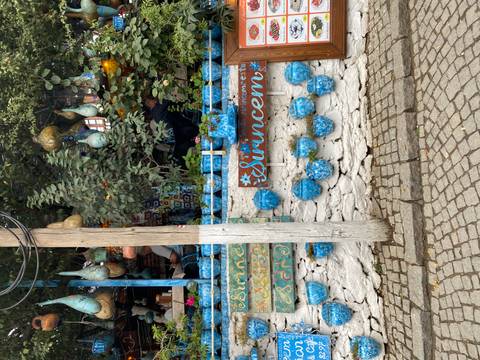       Istanbul marketplace with colorful pottery.
  