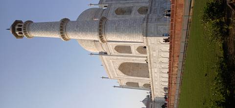 The Taj Mahal with its iconic domes and minarets.