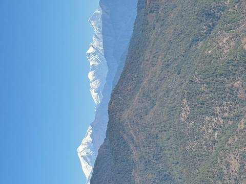 Mountain range with snow-capped peaks.