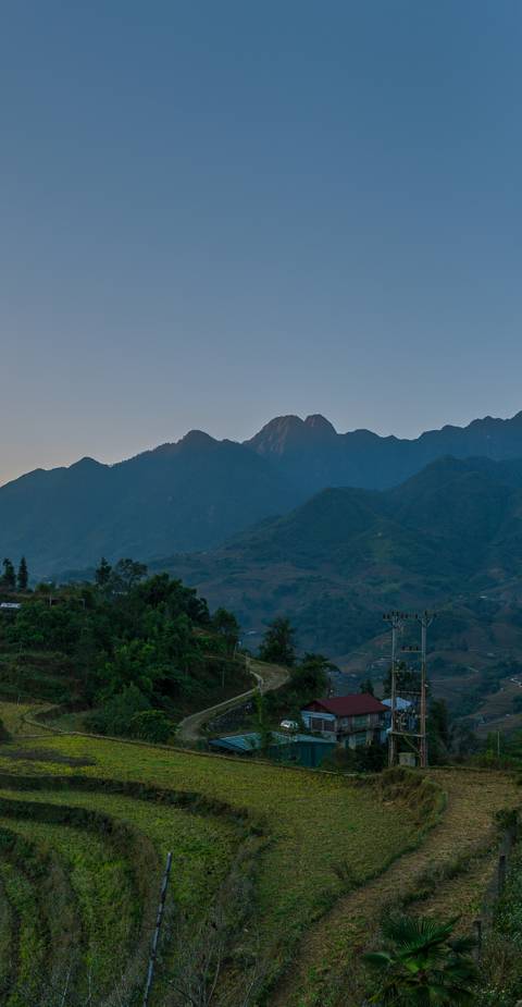       Mountains with clear skies in the background.
  