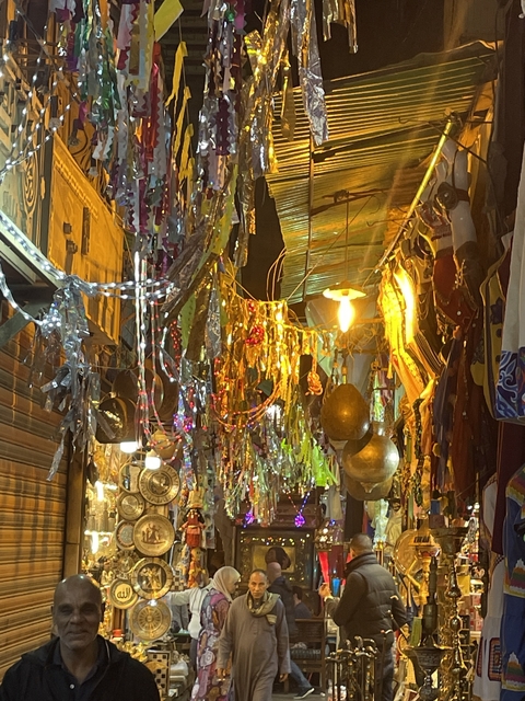       Decorative hanging objects in a market.
  