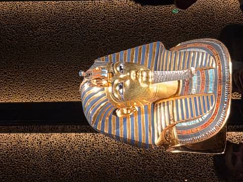 A replica of Tutankhamun's golden mask on display.