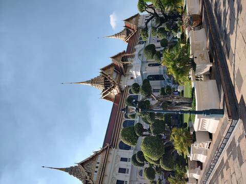       The Grand Palace with manicured gardens.
  
