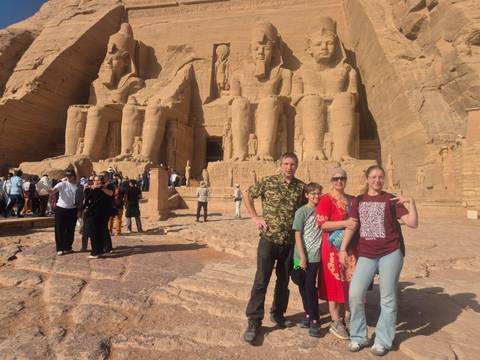      Family posing at the Abu Simbel temple.
  
