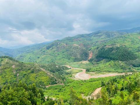Panoramic view of lush green hills in Rwanda.