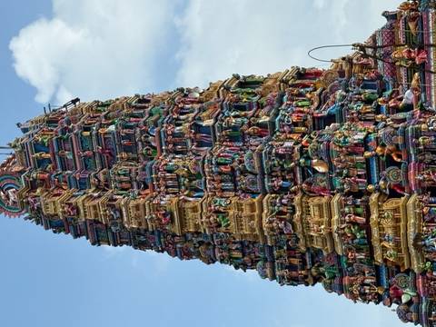 Colorful temple tower with intricate carvings.