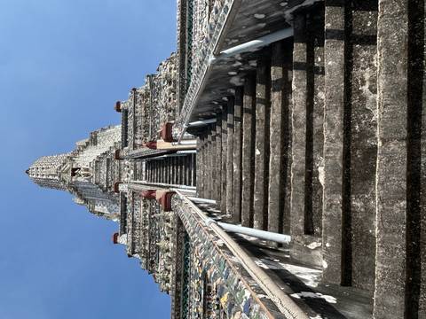       Steep staircase leading up to a stone temple structure.
  
