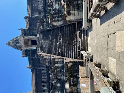       Steep stone staircase leading to an ancient temple entrance
  
