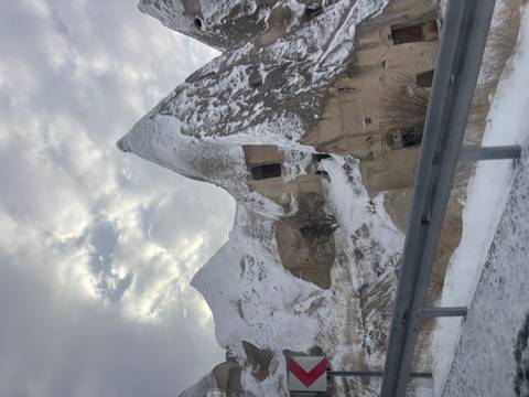 Snowy, pointed rock formations.