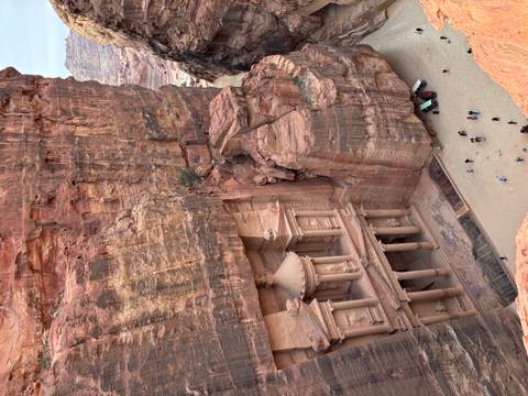       View of the iconic Treasury of Petra, a rock-carved monument.
  