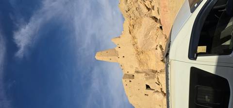 Desert ruins with clear sky in the background.