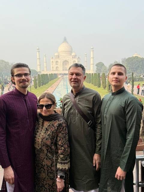 Group standing in front of the Taj Mahal.
