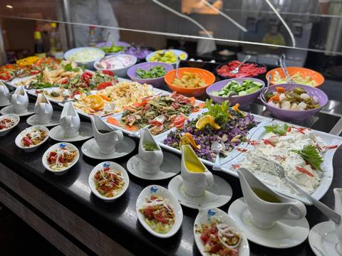 Buffet with salads and appetizers.