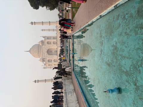 Visitors observing the Taj Mahal.