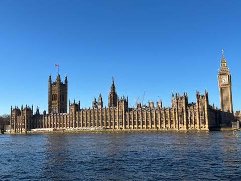 The Palace of Westminster and Big Ben beside the River Thames.