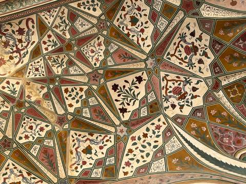 Intricate ceiling design with floral patterns.