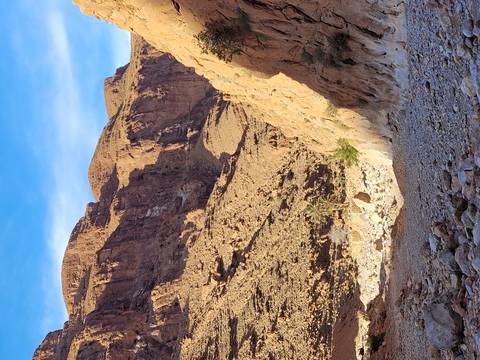       Rocky desert landscape with rugged terrain.
  