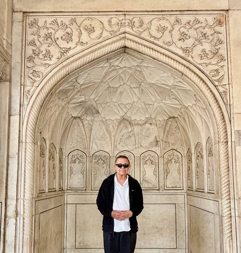 Man in a detailed archway