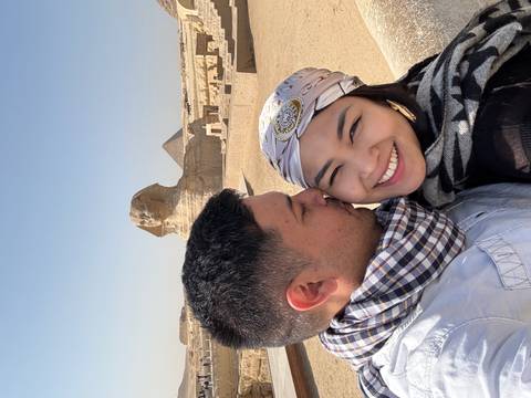       Couple posing with Sphinx in the background
  