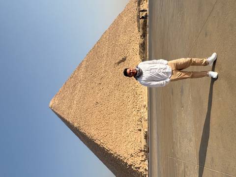       Man standing in front of the Great Pyramid
  